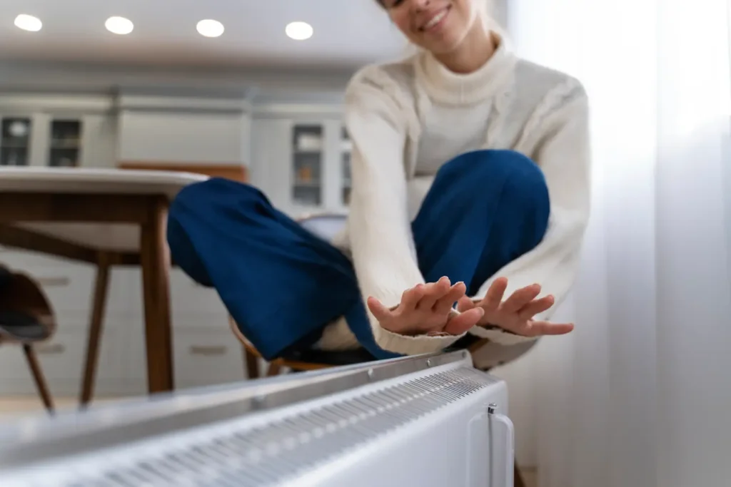 Technician discussing heater maintenance timing and signs for a professional tune-up