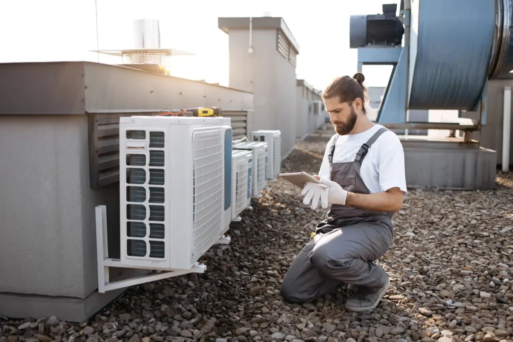 HVAC technician performing fast A/C repair at an Arizona vacation rental